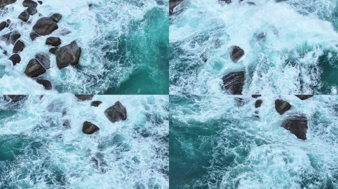 汹涌海浪与礁石的碰撞