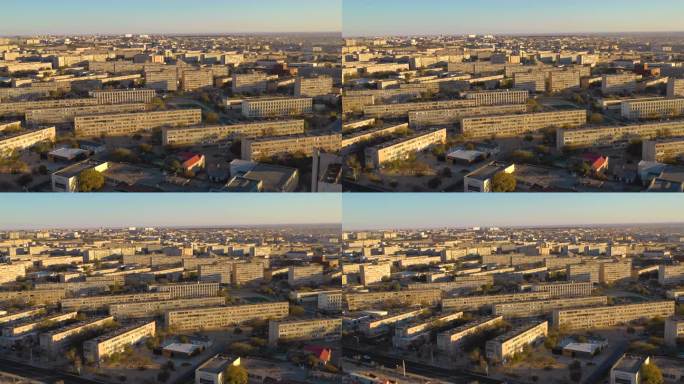 AKTAU, KAZAKHSTAN - 2025年2月1日：日落时分，阿克套城市景观的航拍视角，建筑