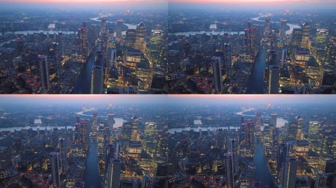 黄昏时分的金丝雀码头和伦敦天际线鸟瞰图，英国伦敦。