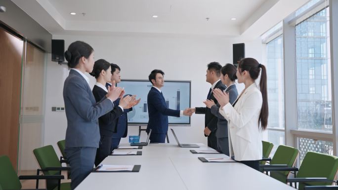 商务会议握手合作团队协作共赢未来