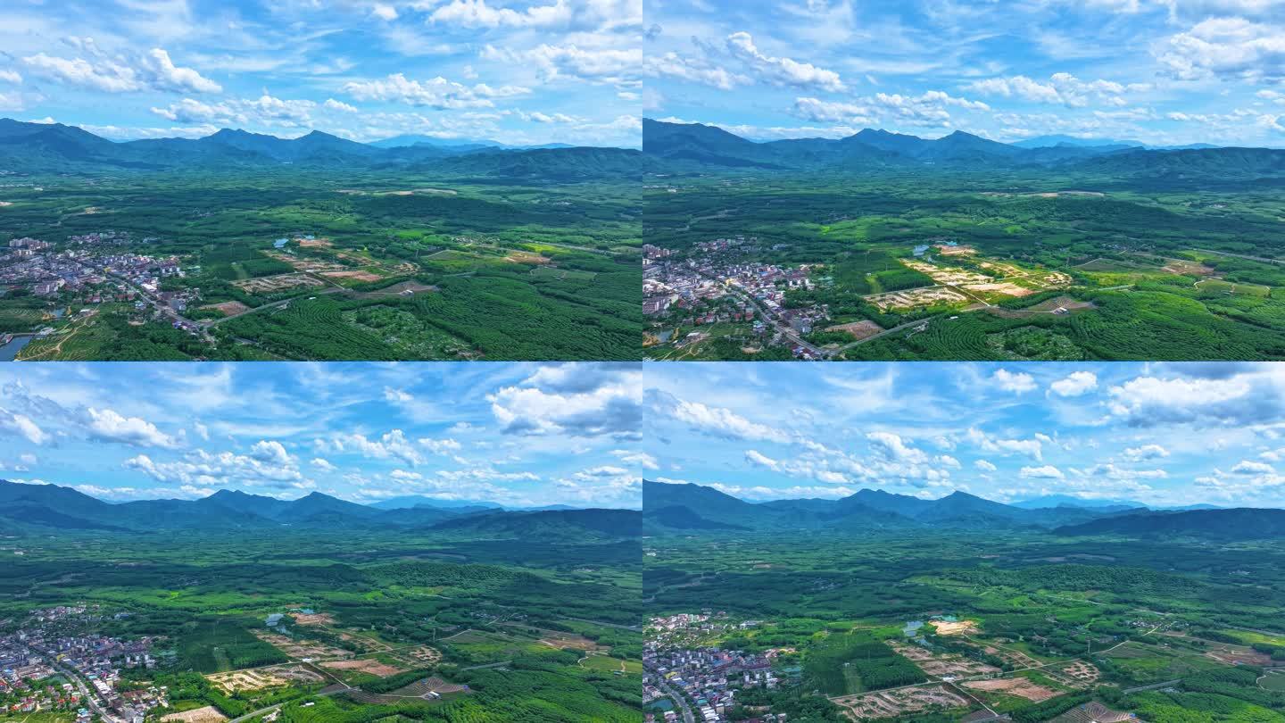 绿色山峦下的城镇风光