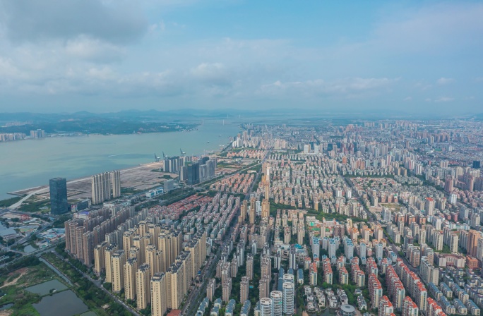 城市高楼林立航拍现代化城市海岸线海湾延时
