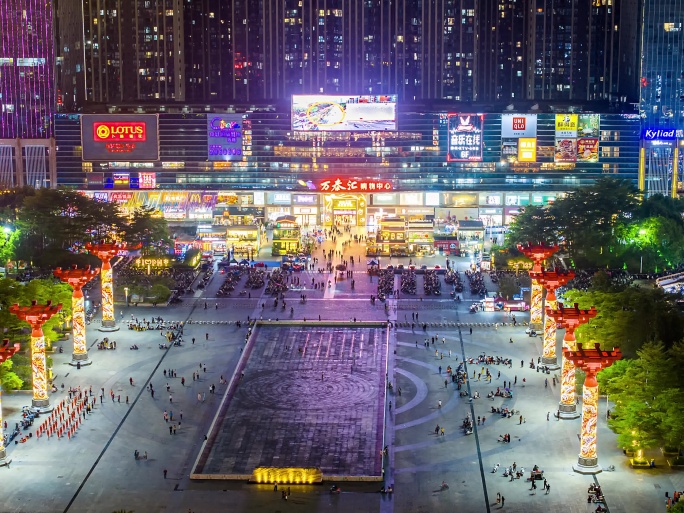 航拍揭阳普宁广场购物中心夜景人群人流延时