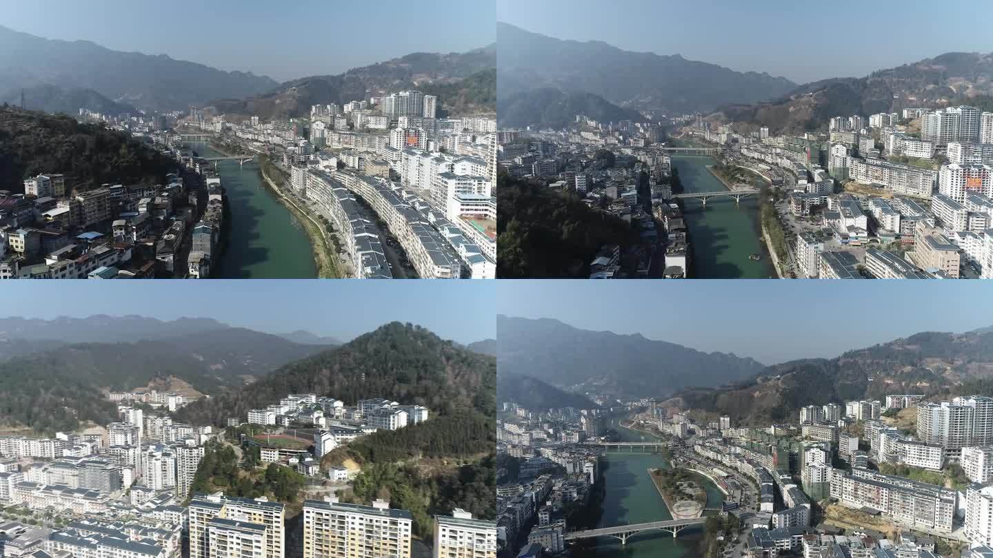 航拍层峦叠嶂间的山城