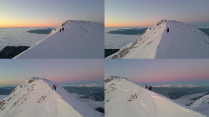 日落时分的山顶徒步旅行，雪峰与云彩，冒险者们。