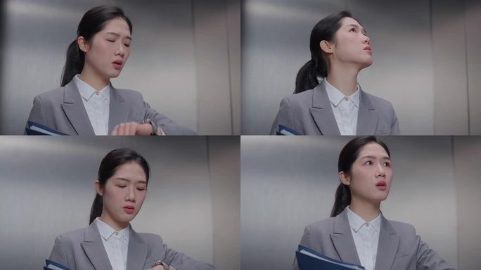电梯里女白领着急