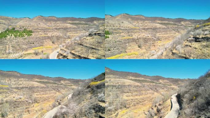 山间公路与自然风光春日山景与蜿蜒道路