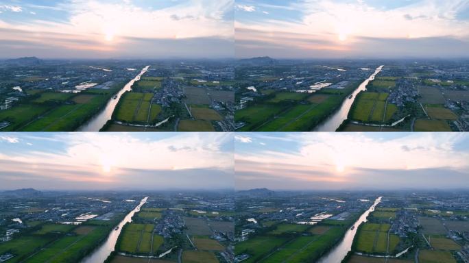 4K航拍稻田旁的京杭大运河航道晚霞日落