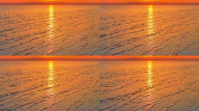 日落夕阳下的金色海浪