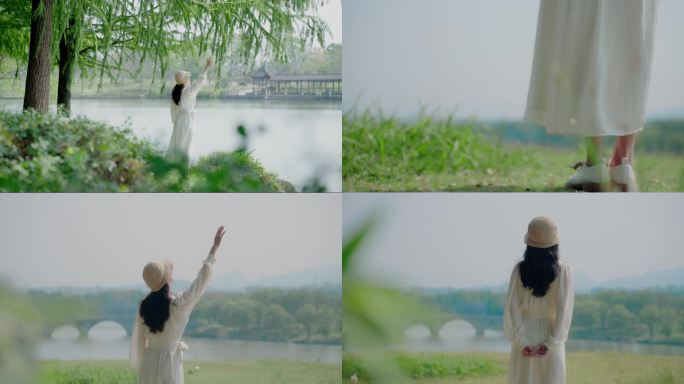 湖边白裙美女看风景背影