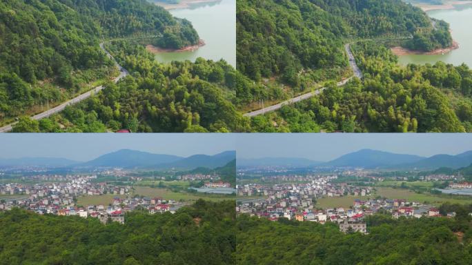 越野车行驶在弯曲的水库山路上新农村