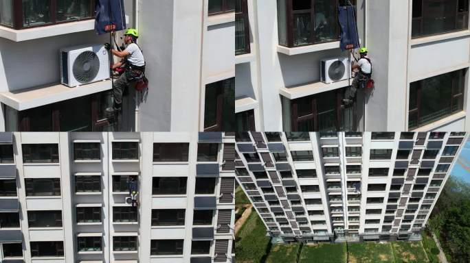 空调安装工人楼外作业