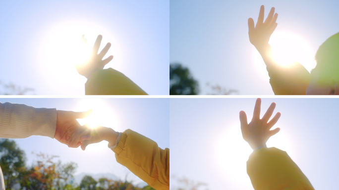 阳光下温暖的牵手儿童的手 妈妈孩子母亲节