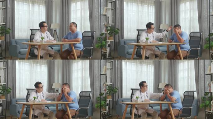 亚洲男性医生与一位肥胖男性患者在诊所内坐在桌子旁，讨论体检结果，传达坏消息，并鼓励患者。