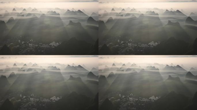 日出时分云雾缭绕中的桂林喀斯特地貌山峰