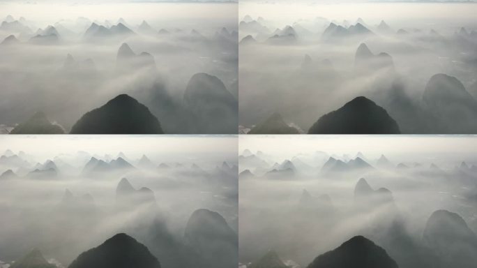 日出时分云雾缭绕中的桂林喀斯特地貌山峰