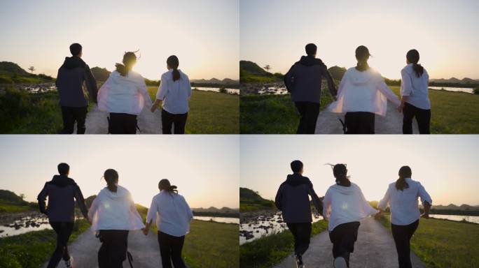 一家三口手牵手 夕阳下奔跑背影 道路