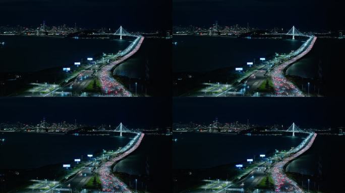 固定镜头无人机视角：清晰夜晚的旧金山-奥克兰海湾大桥。