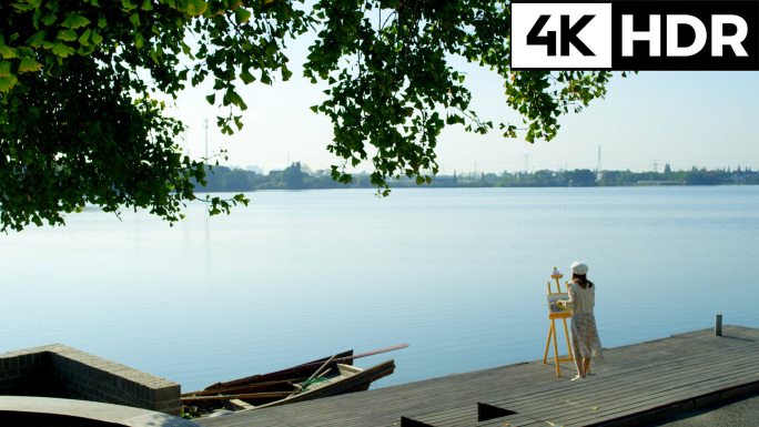 乡村湖边写生少女