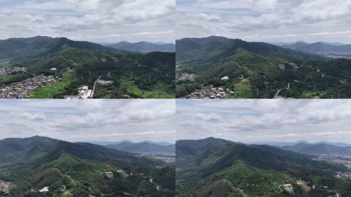 福建山峰航拍山峦叠嶂下的村庄风光