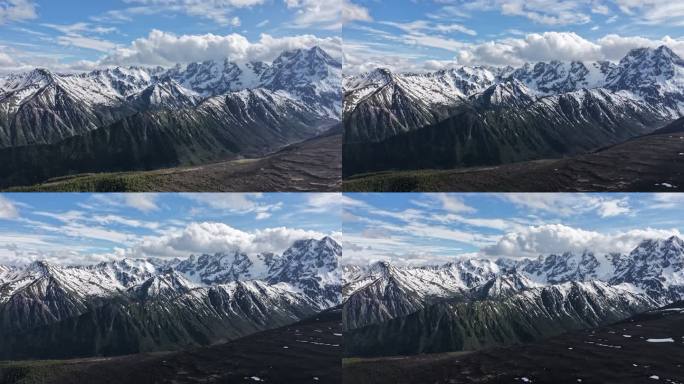 白马雪山垭口拍摄梅里雪山云雾缭绕壮丽景观