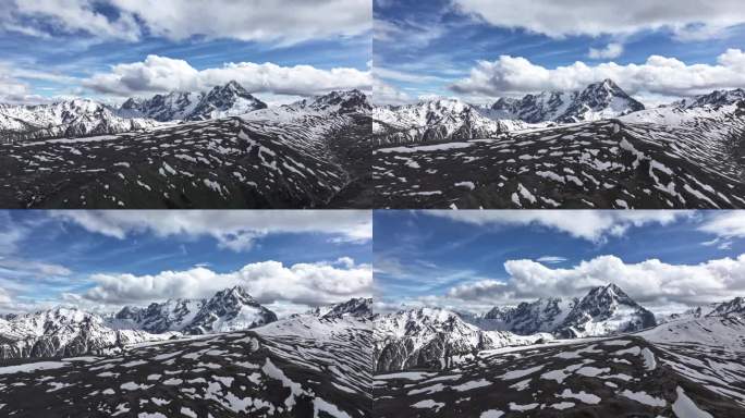 白马雪山垭口拍摄梅里雪山云雾缭绕壮丽景观