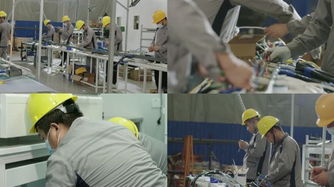工厂工人组装电线电气设备