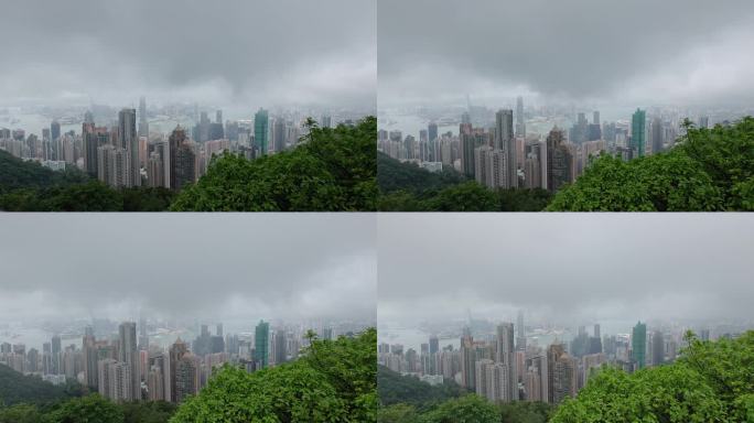 云雾缭绕中香港太平山顶俯瞰维多利亚港
