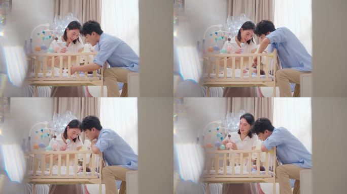 年轻父母照看婴儿