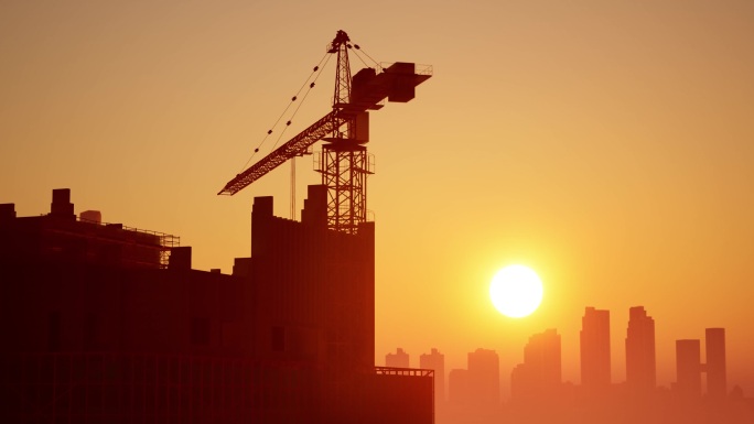 城市建设日出延时建筑工地剪影