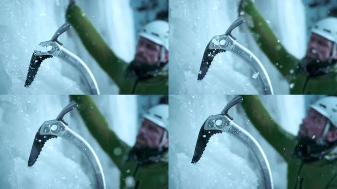 SLO MO冰上攀登者挥舞着冰斧，咬着斜坡