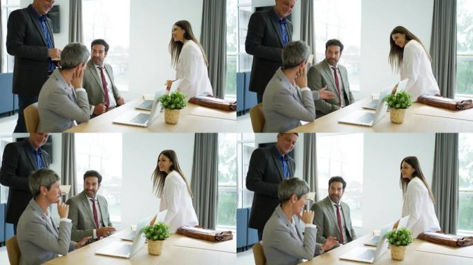 白人同事一起在现代化的办公室工作