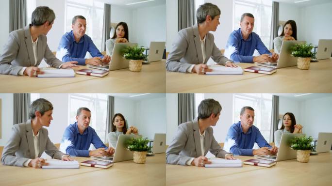 现代白人同事，一起在办公室工作