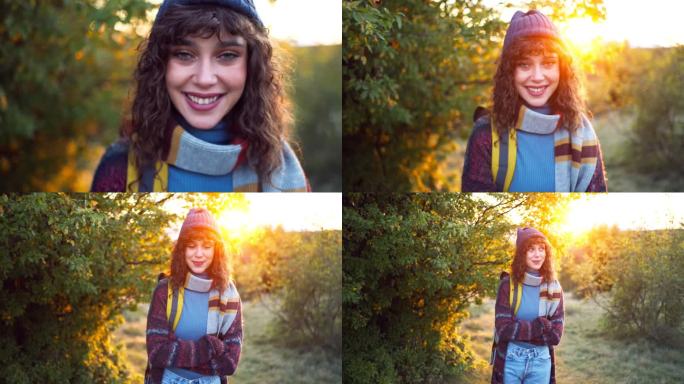 年轻的白人妇女欣赏大自然的肖像，在她的森林远足