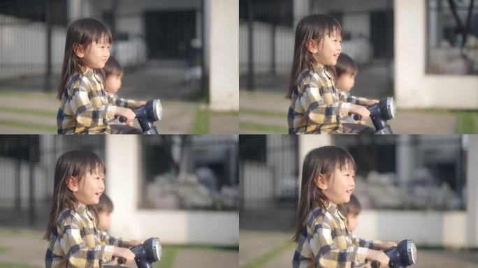 妹妹在玩玩具车