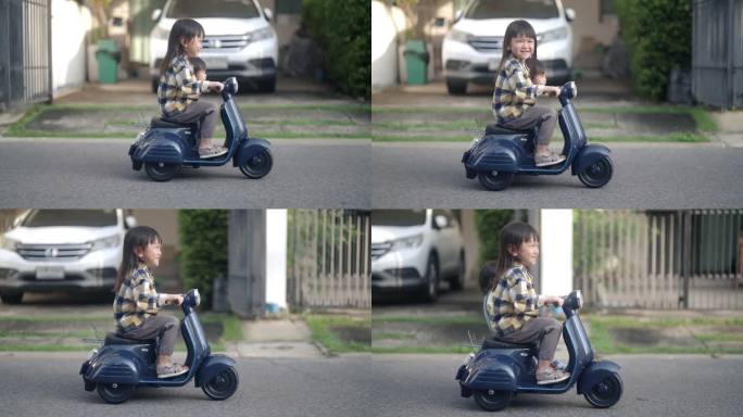 妹妹在玩玩具车