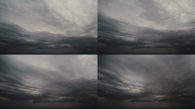 戏剧性的电影云时间流逝。阴沉沉的天空，暴风雨的乌云笼罩着海洋。