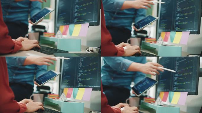 两位IT软件工程师讨论代码程序计算机