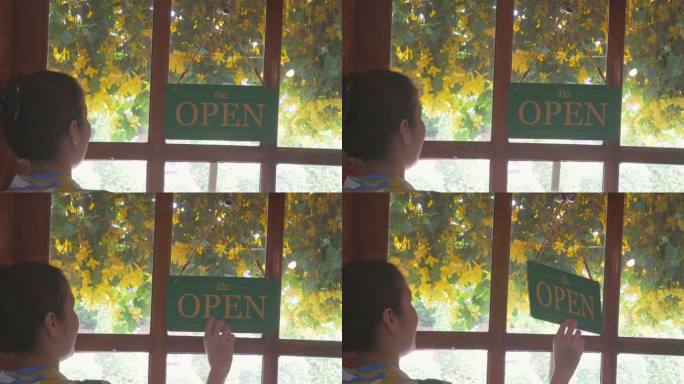 年轻人开了一家店，把前门的牌子从关到开