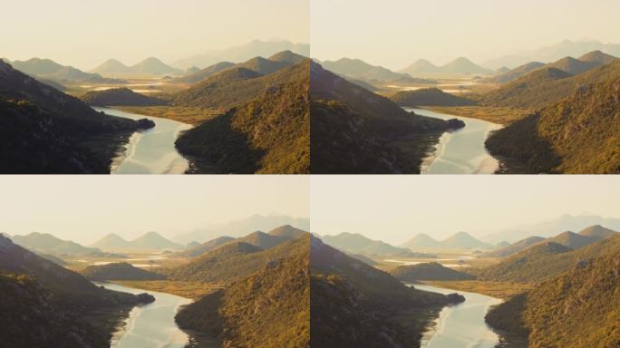 地中海河谷，黎明时分地平线上的山峰。克诺耶维察河峡谷日出。间隔拍摄。温暖的颜色。