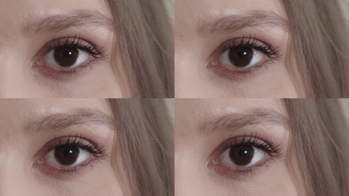近距离美女睁大眼睛看着镜头人类美丽健康的视力