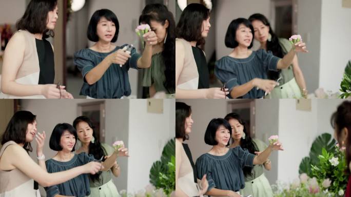 妇女们在花艺教室学习插花技巧