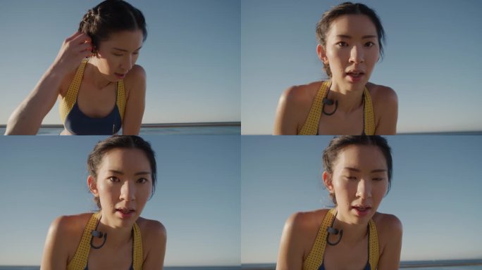 年轻的亚洲女跑步者休息，美丽的女运动员在激烈的跑步锻炼后疲惫不堪，享受健身生活方式的挑战，在日出的海