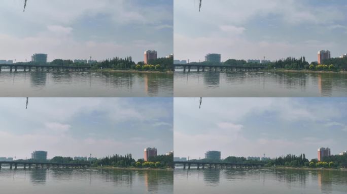 平静的河水与城市建筑