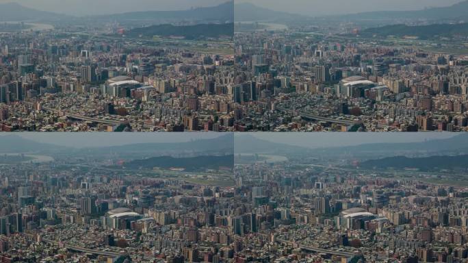 台湾，台北- 2023年5月:台北市中心的延时街景镜头。商业区和住宅区。
