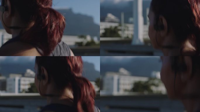 特写女运动员在城市中跑步，享受健康的健身生活方式，在日落时分在城市街道上慢跑