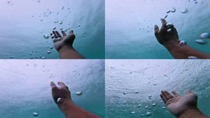 下雨水下视角水下气泡溺水水中光影与手