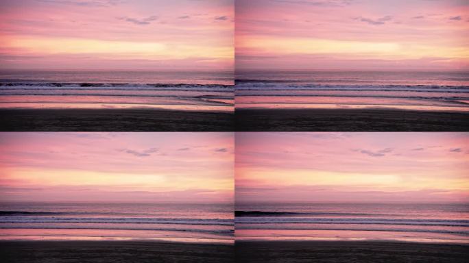 夏日日落在海边和海水户外。色彩斑斓的海岸夜滩和日落时的海岸天空。休闲旅游的度假放松和浪漫目的地的明亮