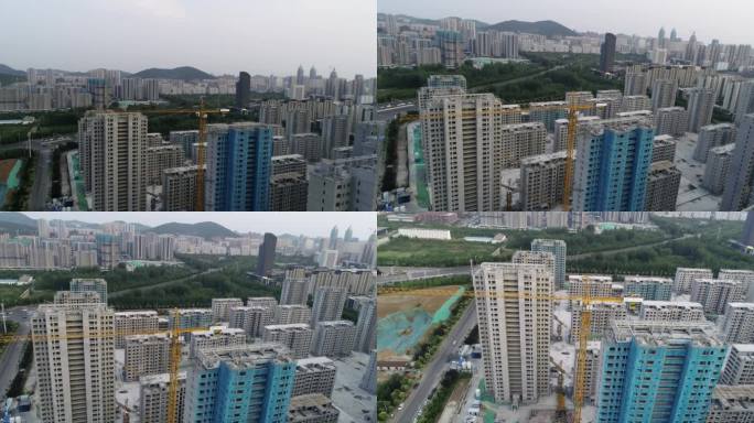 4k城市建设 工地上屹立的塔吊起重机航拍