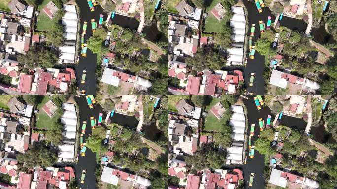 霍奇米尔科的鸟瞰图:无人机拍摄了熙熙攘攘的运河和色彩缤纷的trajinera